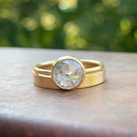 Custom designed engagement ring with recycled yellow gold