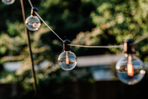 A string of Large Globe Connectable Festoon Lights hanging.
