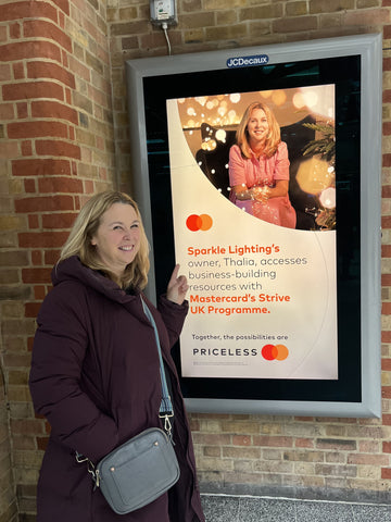 Thalia Shaw and Sparkle Lighting Billboard in Elizabeth Line