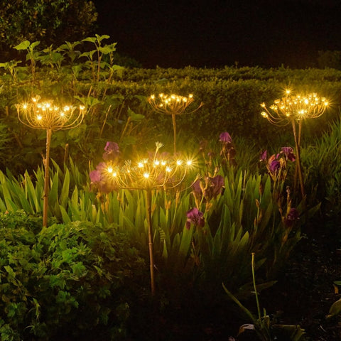 Fennel Garden Solar Stake Lights in a flower bed