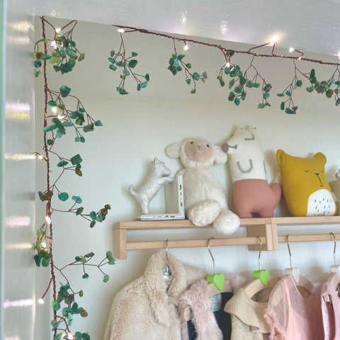 gem children's bedroom fairy lights around the edge of a wardrobe