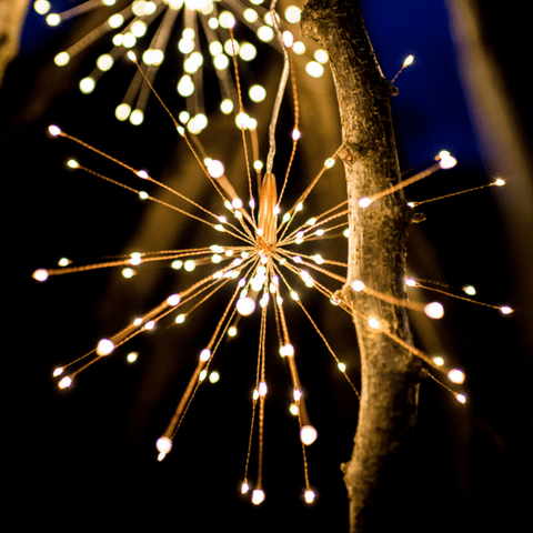 Outdoor hanging starburst lights in silver and copper