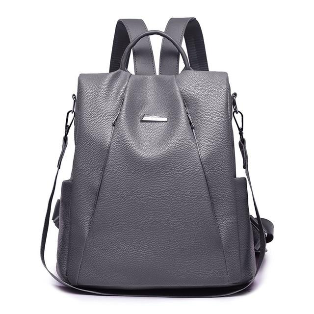 grey leather rucksack