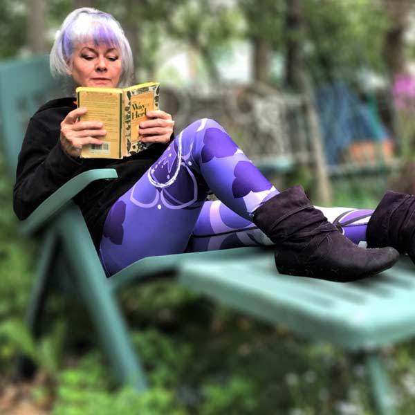 Laurie Benson relaxing in the Crown Chakra leggings