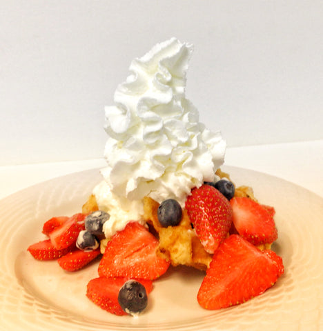 Belgian Liege Waffle topped with fruit and whipped cream