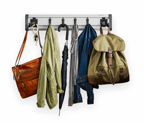 An Entryway GearTrack® Pack hanging a variety of coats, bags and accessories.