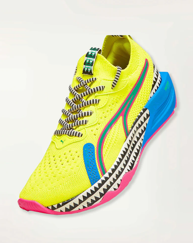 This Puma Women's Training Shoe features a premium knitted upper highlighted with bright color details and lemlem’s traditional triangle print.