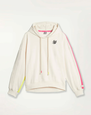 This hoodie features a hand sketched lemlem's interpretation of the Puma logo. The soft off white ghost pepper color is combined with eye-catching bright color side stripes in a fun and fresh new placement.