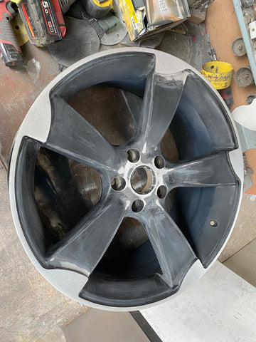 Powder coating alloy wheels