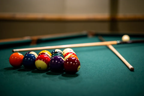 closeup of billiard pool table in play
