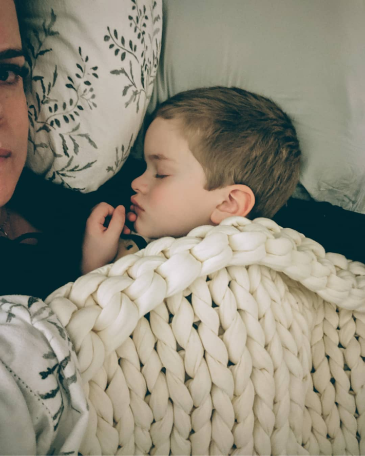 baby sleeping with mother