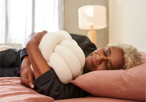 a women sleeping with hugget