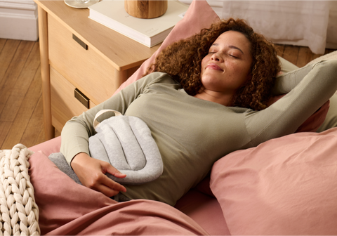 women sleeping with bearaby snuggler