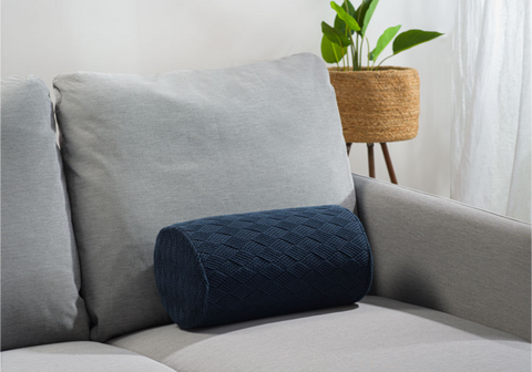blue color bolster pillow cover on couch