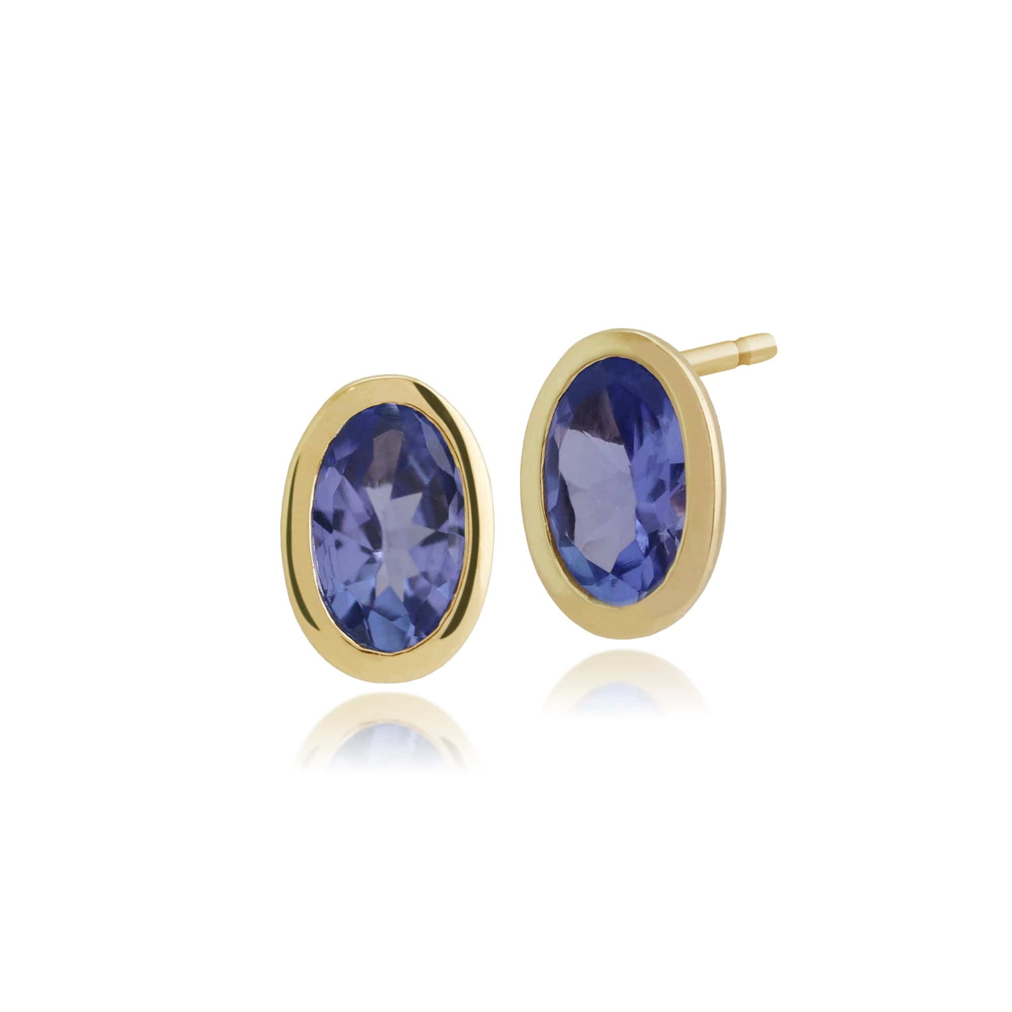 Product photograph of Classic Oval Tanzanite Bezel Stud Earrings In 9ct Yellow Gold from Gemondo Jewellery