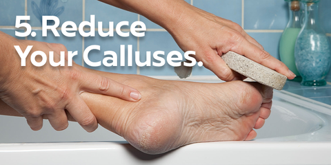 Reduce calluses image of foot in bathtub with pumice stone used to reduce calluses and rough skin on feet