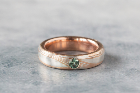 mokume gane wedding band ring with green stone