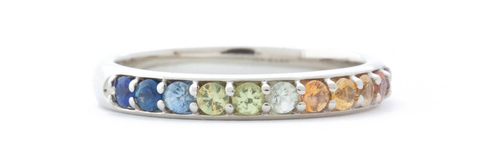 The Rainbow Band featuring an Arizona Peridot on a white background 