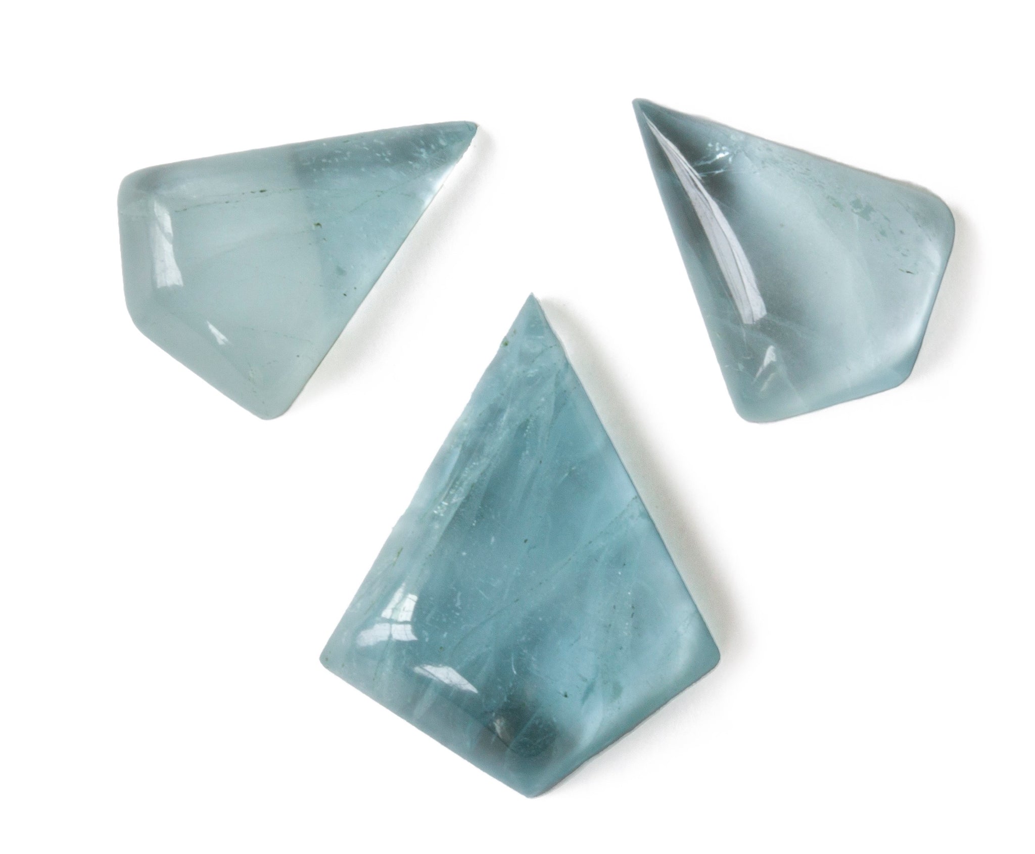 Three triangular Aquamarine stones