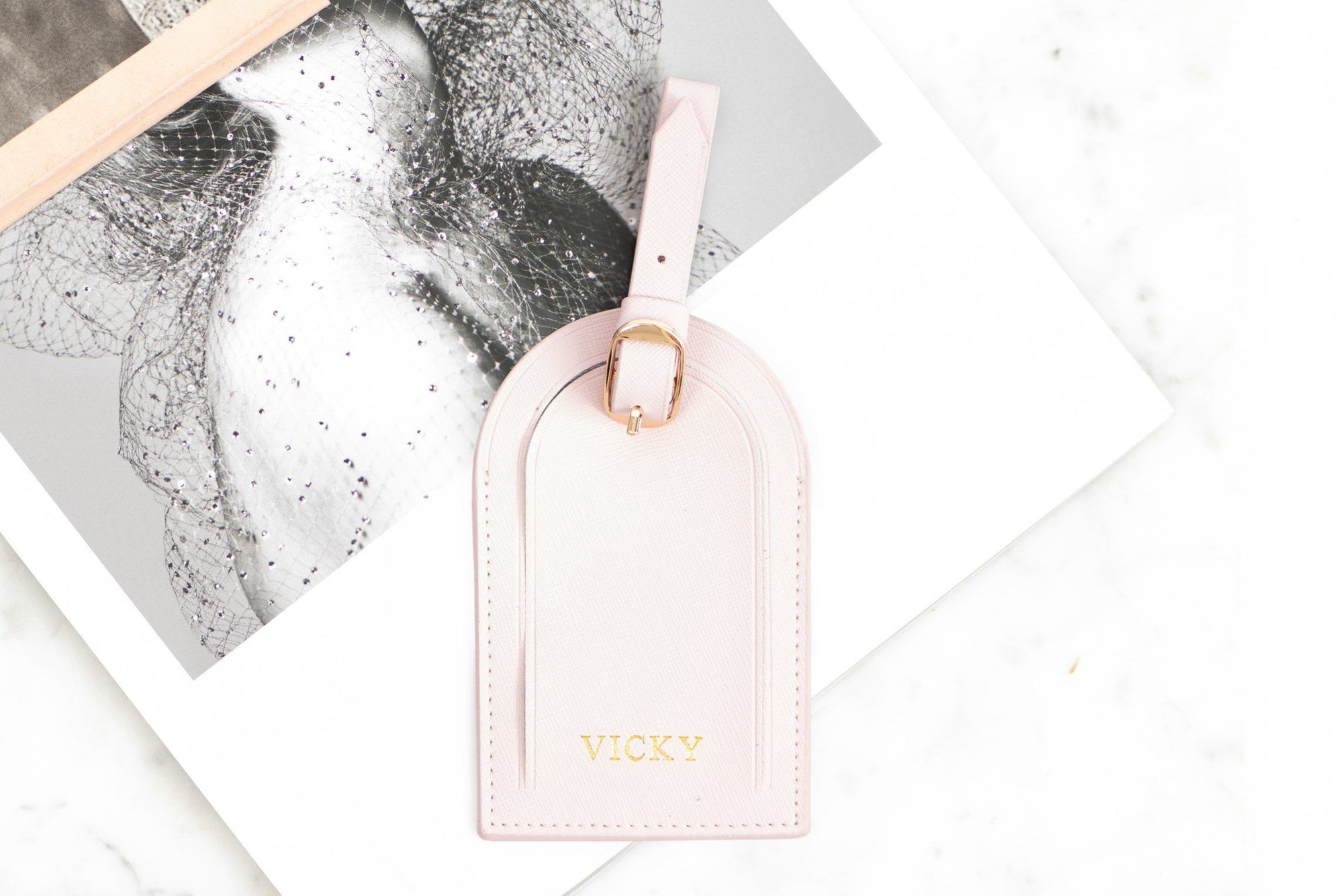 pink leather luggage tag