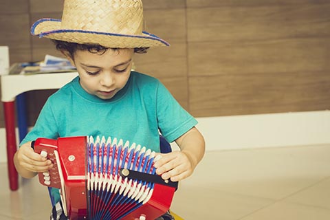 Child playing accordion