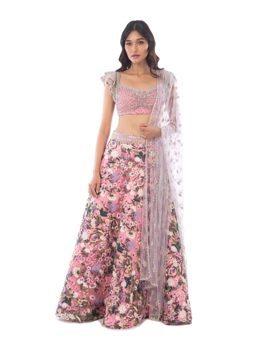 Monisha Jaising - A concept lehenga with a classic bootie drape adorn with  zardozi embroidery, detailed with jewelled stones and pearls. A slender cut  at the waist gives a slimmer and fitted