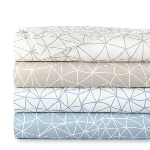 A stack of four patterned bed sheets from Southshore Fine Linens.