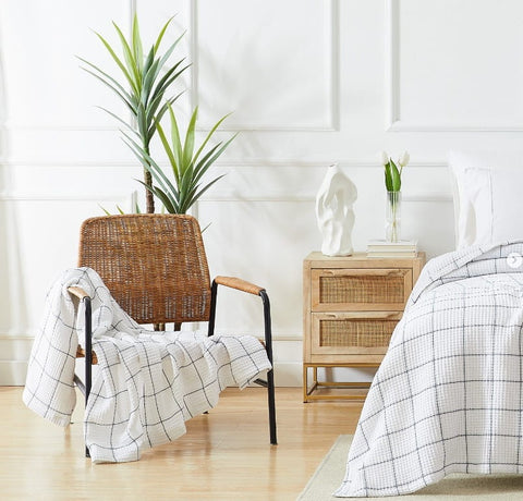 plants with bright walls in a bedroom that just had a makeover