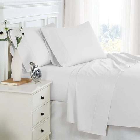 A made bed with 300 thread count cotton percale sheet set in white from Southshore Fine Linens.