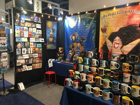 art booth selling wild women artwork