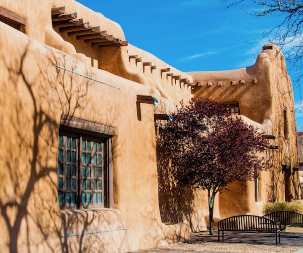 Adobe building under a blue sky in New Mexico