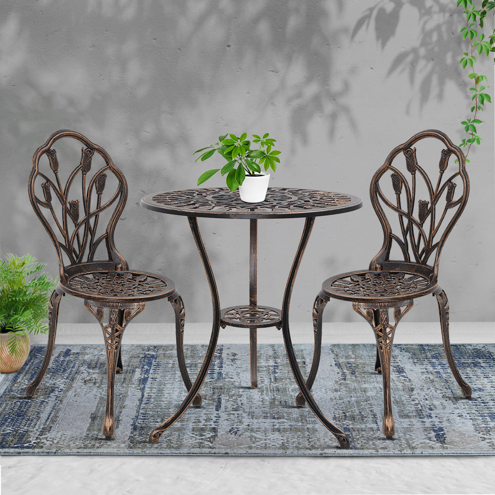 cast iron garden table and 2 chairs