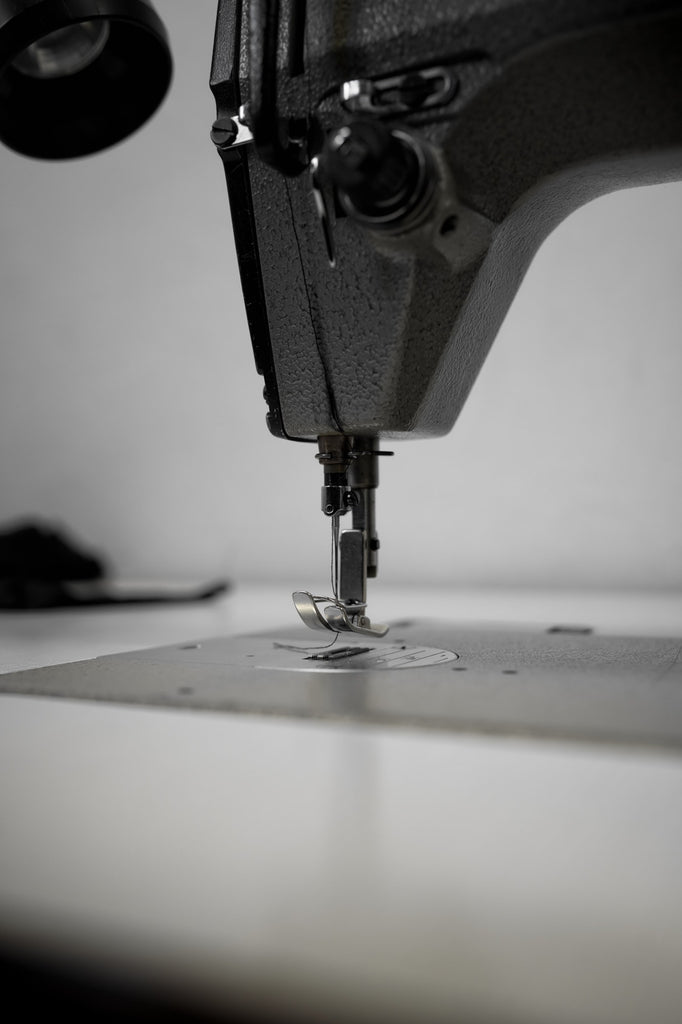 A close-up shot of a sewing machine