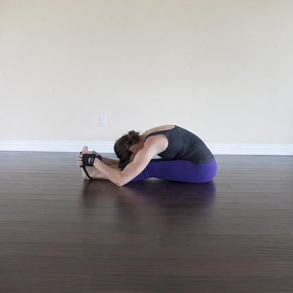 Woman doing paschimottanasana seated forward bend Vector Image