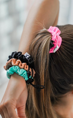 black, pink, blue, and beige best scrunchies for working out