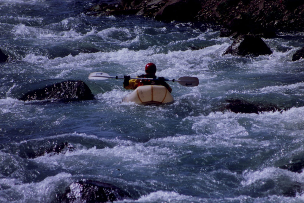 Thor Tingey testing the very first Alpacka Raft on the Aniakchak River, 2001