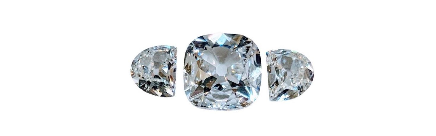 64Facets’ Loose Diamonds arranged in a Half Moon Design