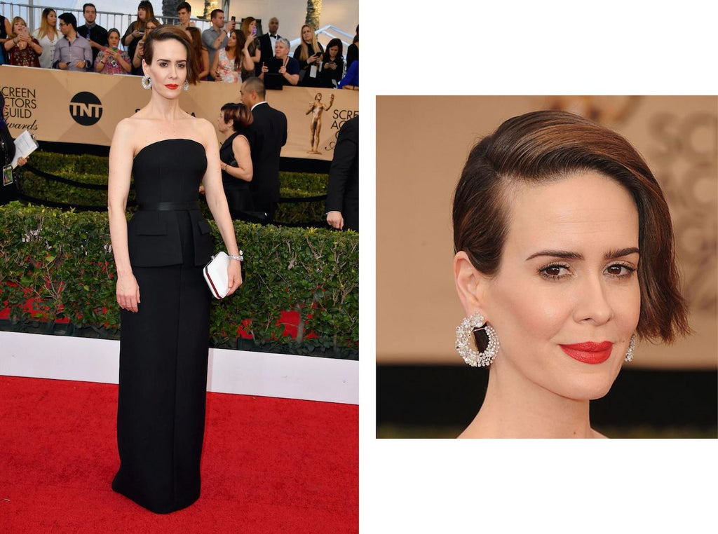 Sarah Paulson wearing diamond hoop earrings