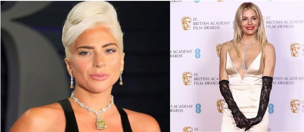 Lady Gaga and Sienna Miller wearing a Tiffany's yellow diamond lariat necklace and a Messika Diamond Lariat Necklace 