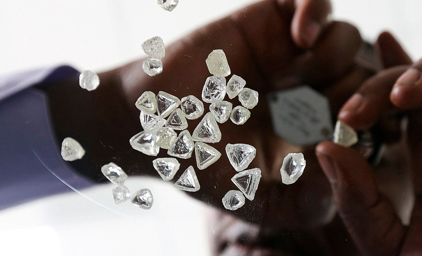 Rough diamonds being assessed 