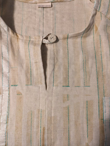 The front of the shirt, showing the nicely finished collar and the button loop