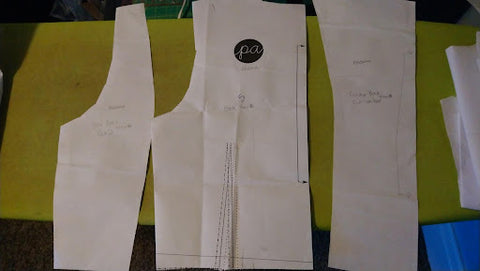 Pattern pieces for the bodice back: the original bodice back, a modified side back piece, and a modified centre back piece.