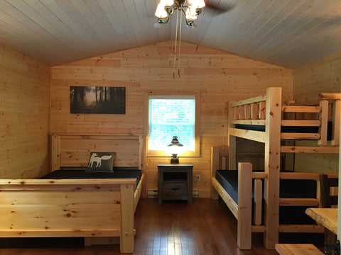 bedframe and bunk bed at summer camp