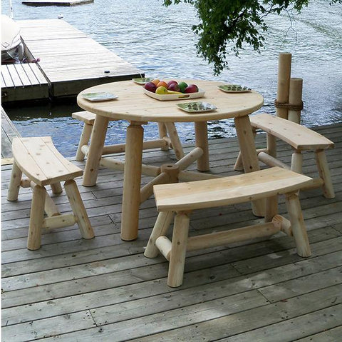 outdoor round table on a deck by the lake
