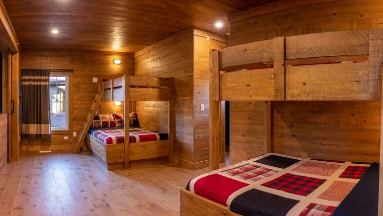 Custom Bunks and wall cladding for hotel and cottage by Log Furniture and More