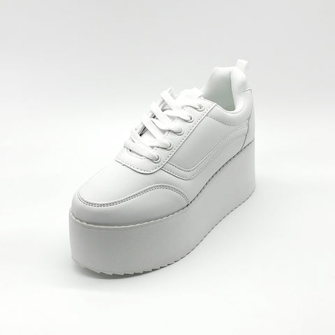 slim white trainers