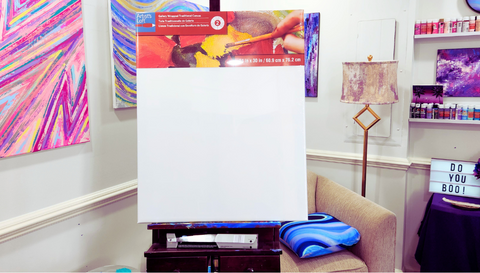 Blank canvas sitting on an easel