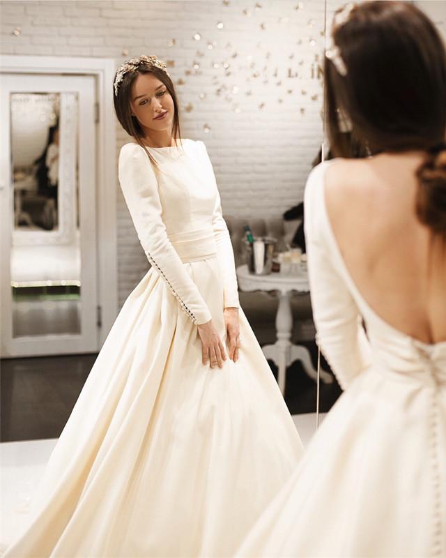 white satin wedding dress with sleeves