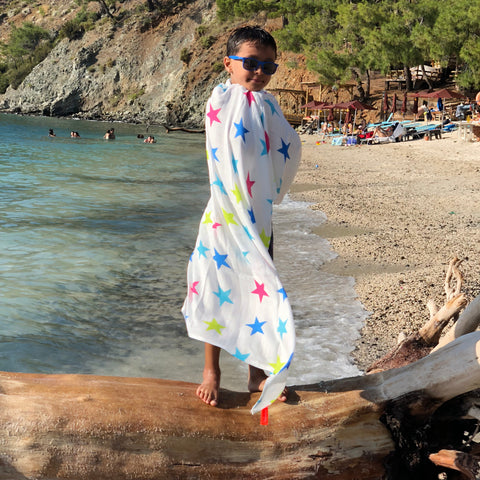 Bebekish bamboo muslin swaddle is for beach towel.