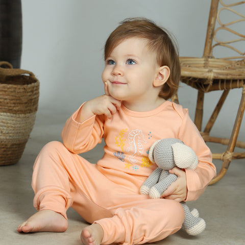 Baby with organic bebekish clothing